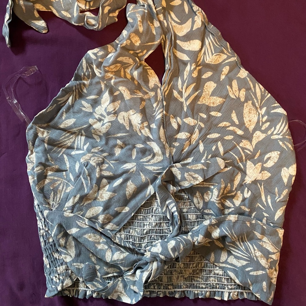 Brand new endless blu tie front halter top. Light blue leaf pattern. Size L